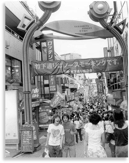 “Strolling”. Takeshita Street in Harajuku, Tokyo where junior high and high school students hang out. August 2001.