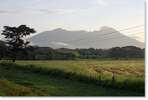 Fields and the Mombacho volcano in southwest Nicaragua. Photo by Nic Paget-Clarke. 