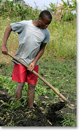 A cooperative member turning soil in Marracuene, near Maputo, the capital of Mozambique.