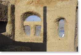 Windows in the cob house.
