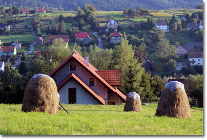 Hay stacks overlook the village of Stryszów, in southern Poland.