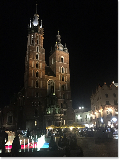 St. Mary's Basilica, in Krakow's main square, Rynek Glowny -- Europe's largest market square. The first church on this site was built in the 1220s. Krakow is the largest city in southern Poland.