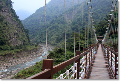 Bridge on the Tanayiku River in the mountains of the Alishan National Forest in central Taiwan.
