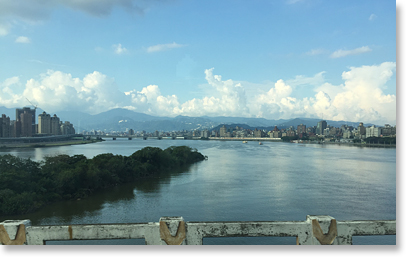 Crossing the Danshui River in Taipei.