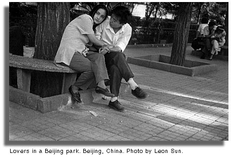 Lovers in a Beijing park, China. Photo by Leon Sun