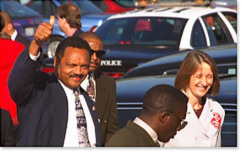 Rev. Jesse Jackson and Patricia Ireland arrive in San Diego, California, in support of affirmative action. 1996. Photo by Nic Paget-Clarke.