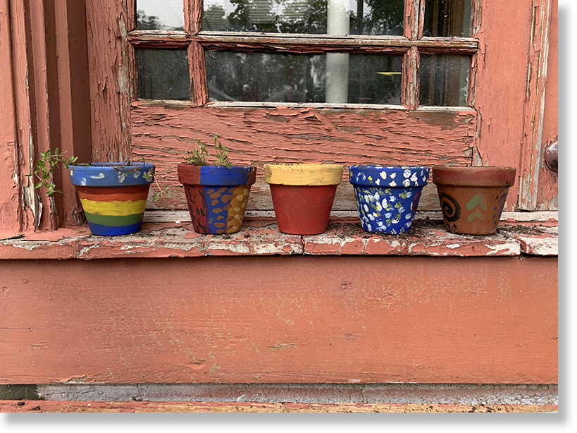  Pots painted by children at an MRCC event decorate the offices of the Missouri Rural Crisis Center, Columbia, Missouri. Photo by Nic Paget-Clarke. 