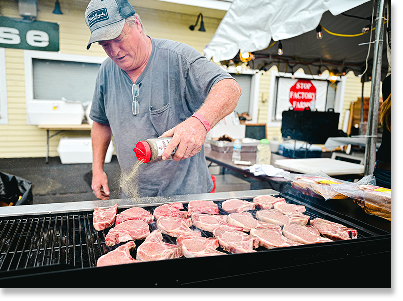 Patchwork Family Farms cooking pork chops for Farm Aid 2021. All photos by Jessica Plance.