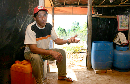 Sebastião Vieira, a regional co-coordinator, in his family's home in the joint MST (Landless Rural Workers' Movement) camps, Dom Pedro Casussaudale and Camilo Torres near São Paulo, Brazil / 2004. Photo by Nic Paget-Clarke.